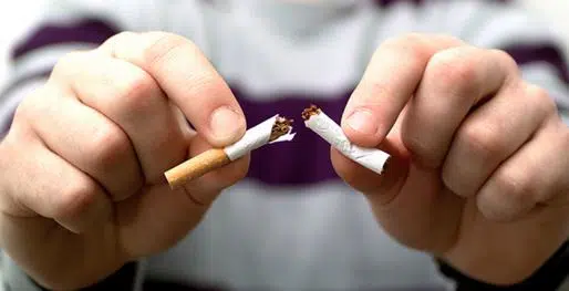 Quit smoking to stop a scratchy throat